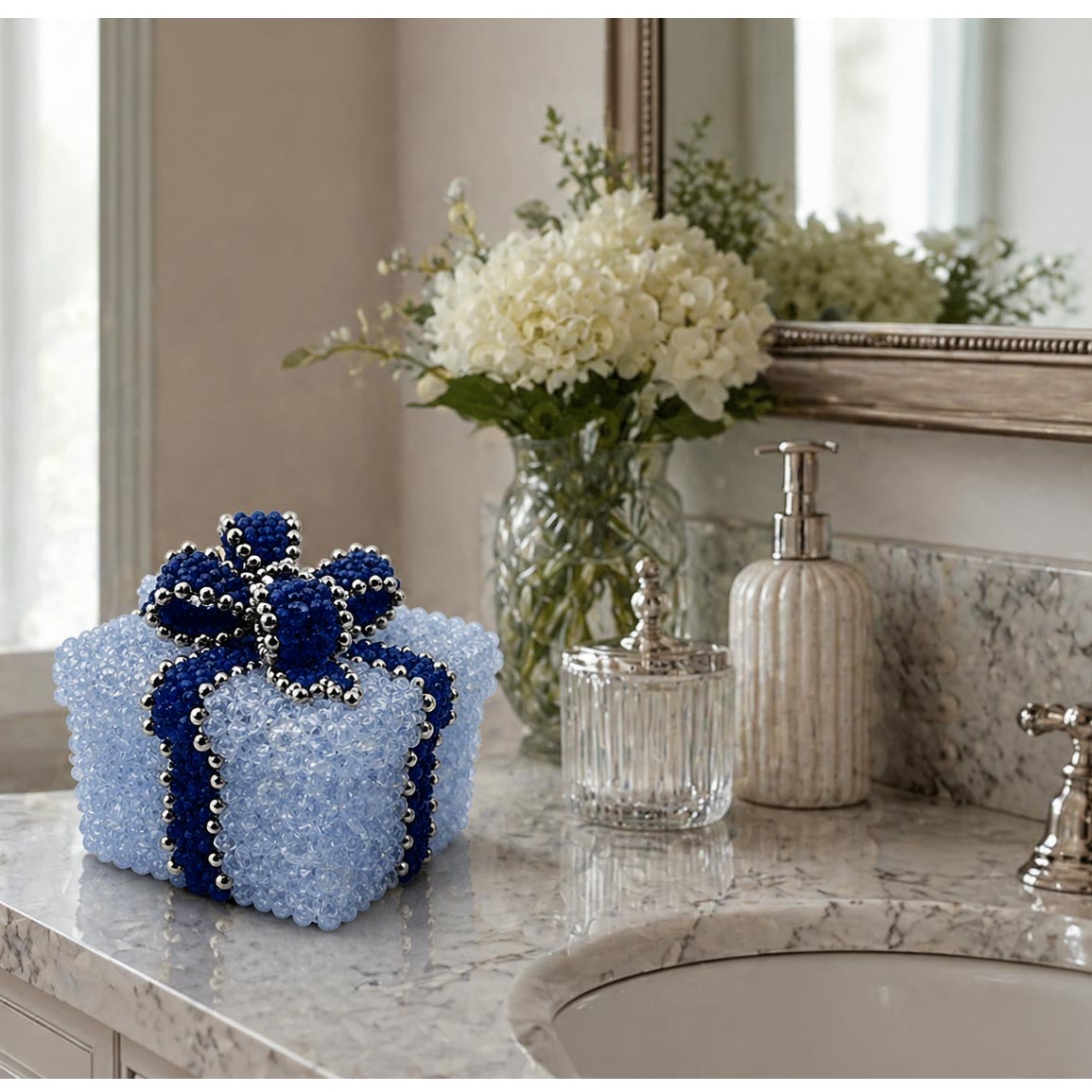 Ice Blue Beaded Box with Dark Blue Beaded Bow on a Bathroom Counter