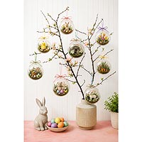 Easter tree decorating idea featuring fillable ornaments and spring miniatures for Easter and seasonal home décor.